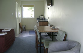 kitchenette and heater in the room