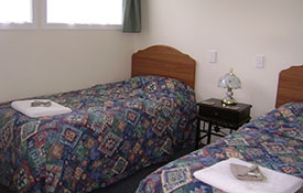 two single beds in the second room